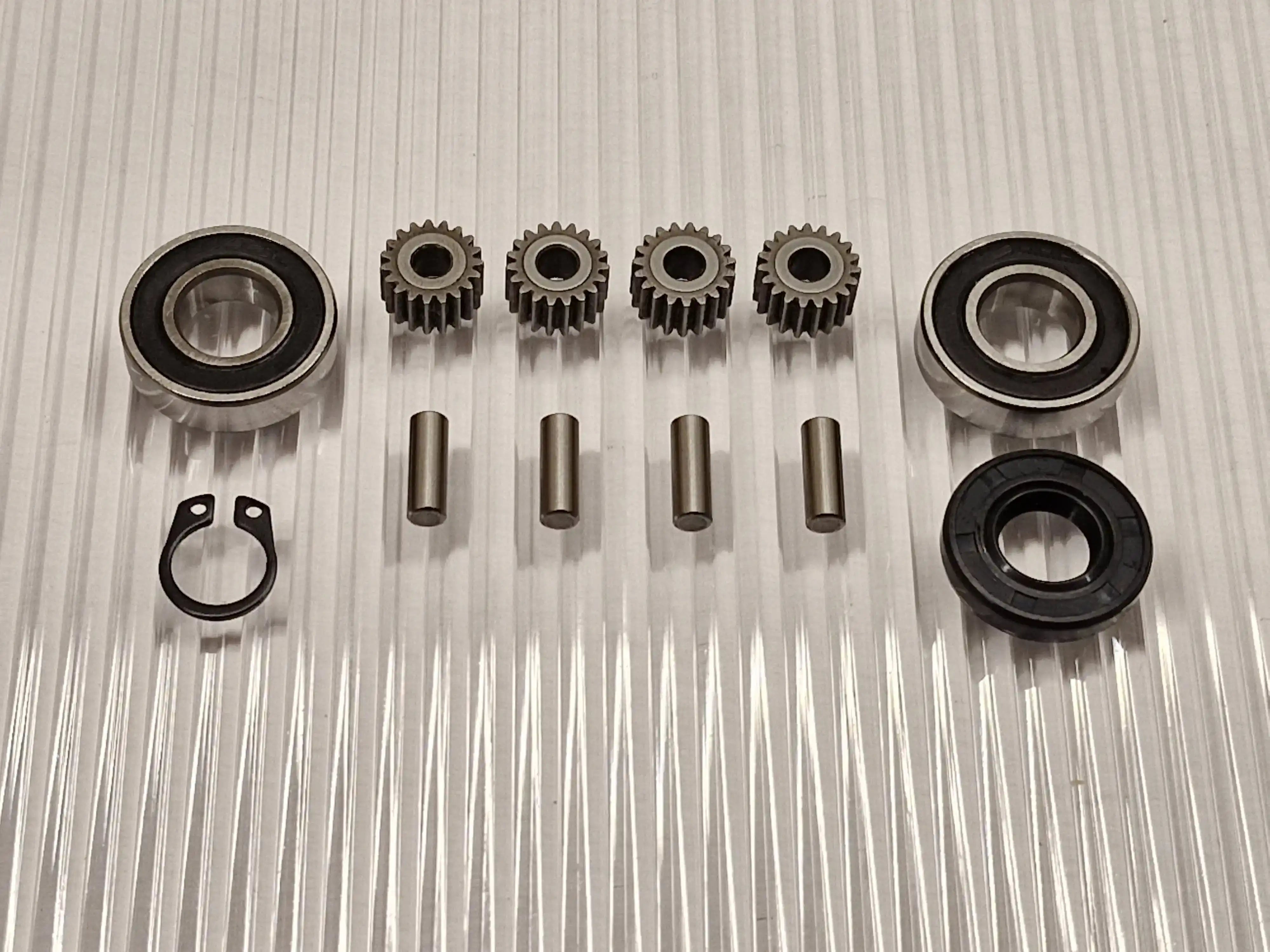 Honda Miimo 300 310 500 520 pyöränmoottorin korjaussarja uusilla teräksisillä keskirattailla, laakereilla ja tiivisteillä